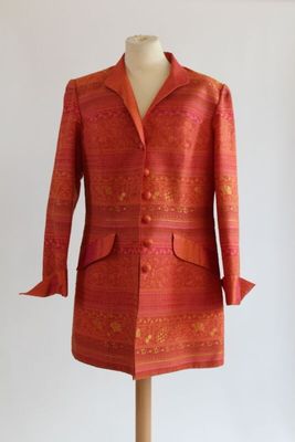 an image of a red jacket on a mannequin
