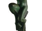 statue of a man with a gun in his hand on a black base