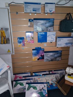 a room with a lot of boxes and papers on the wall
