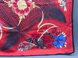 an image of a red and black scarf with flowers and butterflies
