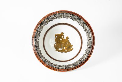 an image of a plate with a picture of a man and a woman on it