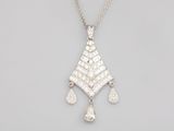 a white gold and diamond pendant