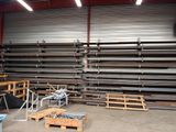 a room with a lot of shelves and pallets in it