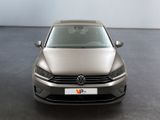 the front of a silver volkswagen vw golf parked in a room