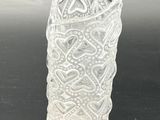 an image of a glass vase with a decorative design on it