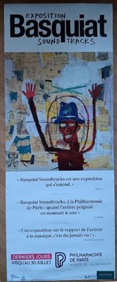 a poster with a picture of a man in a hat on it