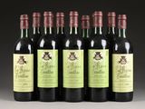 six bottles of wine are lined up in a row