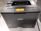 a printer that is sitting on top of a table