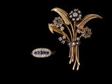 une image représentant un « broochle » et un autre « broochle » sur fond noir