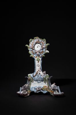 a clock that is sitting on top of a table