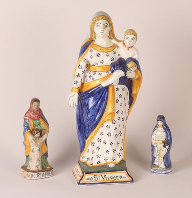 three figurines of the virgin mary and child jesus