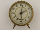 a clock that is hanging on the wall in the room