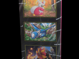 a picture of a box of pokemon cards on a black background