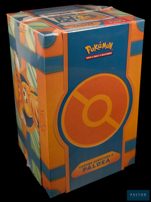 une boîte dans laquelle se trouve une figurine de Pokémon