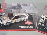 two toy cars in a display case on a table