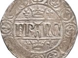 an old silver coin with a crown on top of it