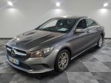 la mercedes cla est garée dans un garage dont le sol est recouvert de carreaux