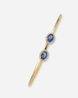 une paire de boucles d'oreilles « ear climbers » en saphir et diamants