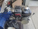a small engine that is sitting on the side of the road