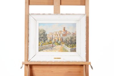 an image of a painting on a easel with a picture of a castle in the background