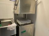 a kitchen with a sink and a dishwasher in it