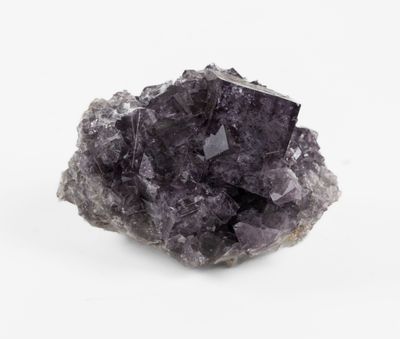 a close up of a piece of rock with a small piece of rock in the middle of it