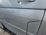 a close up of a car door handle on the side of the car