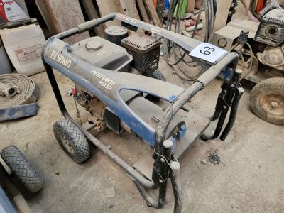 an image of a small portable generator in a garage