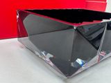 a glass container that is sitting on a table