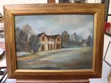 a picture of a painting of a house on a table