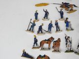 a lot of figurines that are on a table