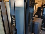 an image of a large metal cabinet in a warehouse