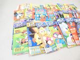a lot of comic books on the table