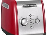 an image of a red toaster on a white background