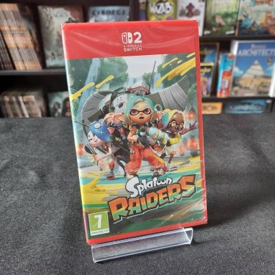 Le jeu « Splatoon Rangers » pour Nintendo Wii est exposé devant une bibliothèque