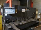 an image of a machine that is working on a piece of metal