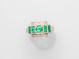 an emerald and diamond ring