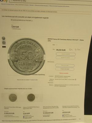 un écran d'ordinateur sur lequel s'affiche l'image d'une pièce de monnaie