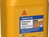 a close up of a yellow plastic container with a red lid