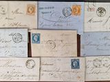 an image of a collection of old envelopes on a table
