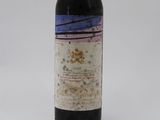a bottle of wine that is sitting on a table