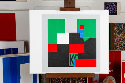 a picture of a painting on a easel in a room