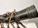 a large metal object that is on display on a table