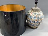 two vases that are next to each other on a table