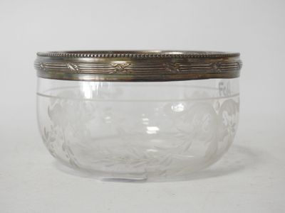 a glass jar with a lid on a white surface