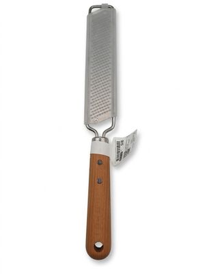 a cheese grater with a wooden handle on a white background