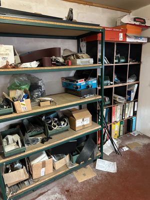 a room with a lot of boxes and boxes on the shelves