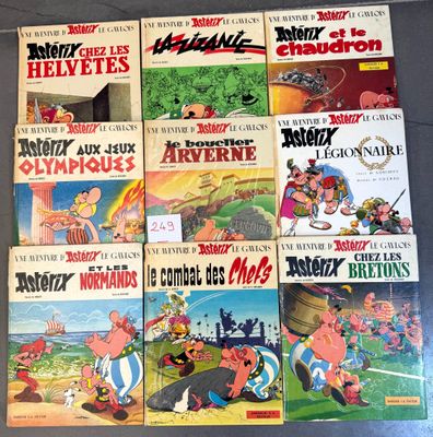 several children ' s cartoon books are lined up on a table