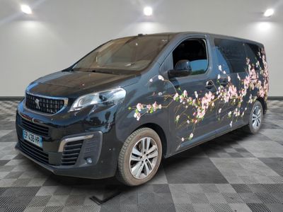 fourgonnette Citroën avec des fleurs peintes sur le côté