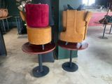 two chairs that are sitting on top of each other
